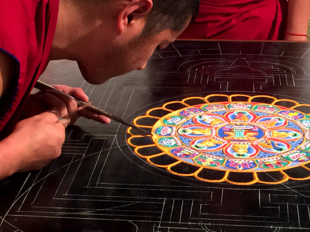 Tibetan monks create sand mandala