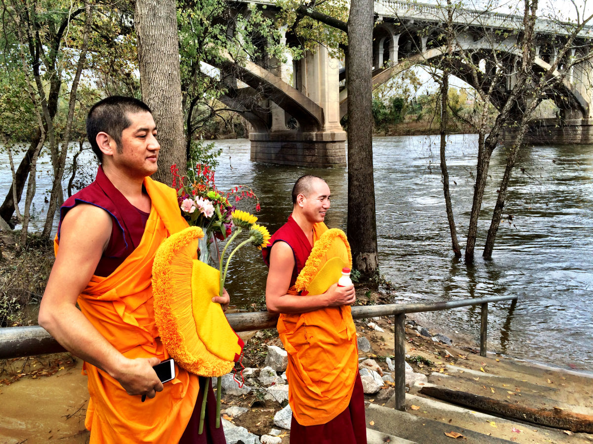 Monks by the water