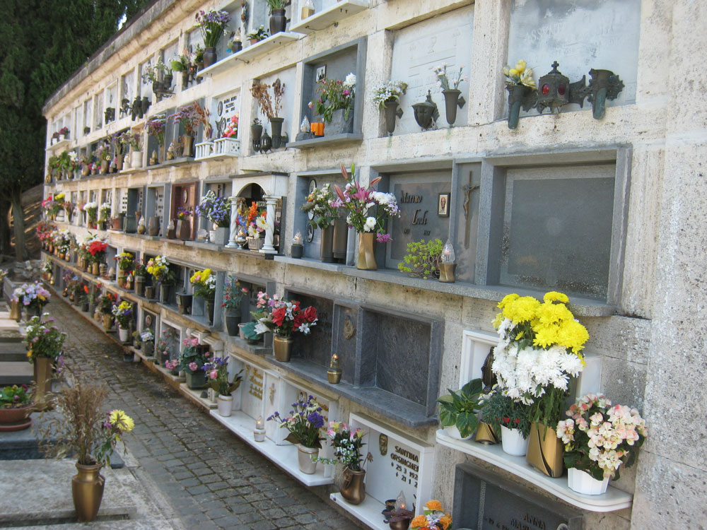 Outdoor columbarium with flowers and memorials